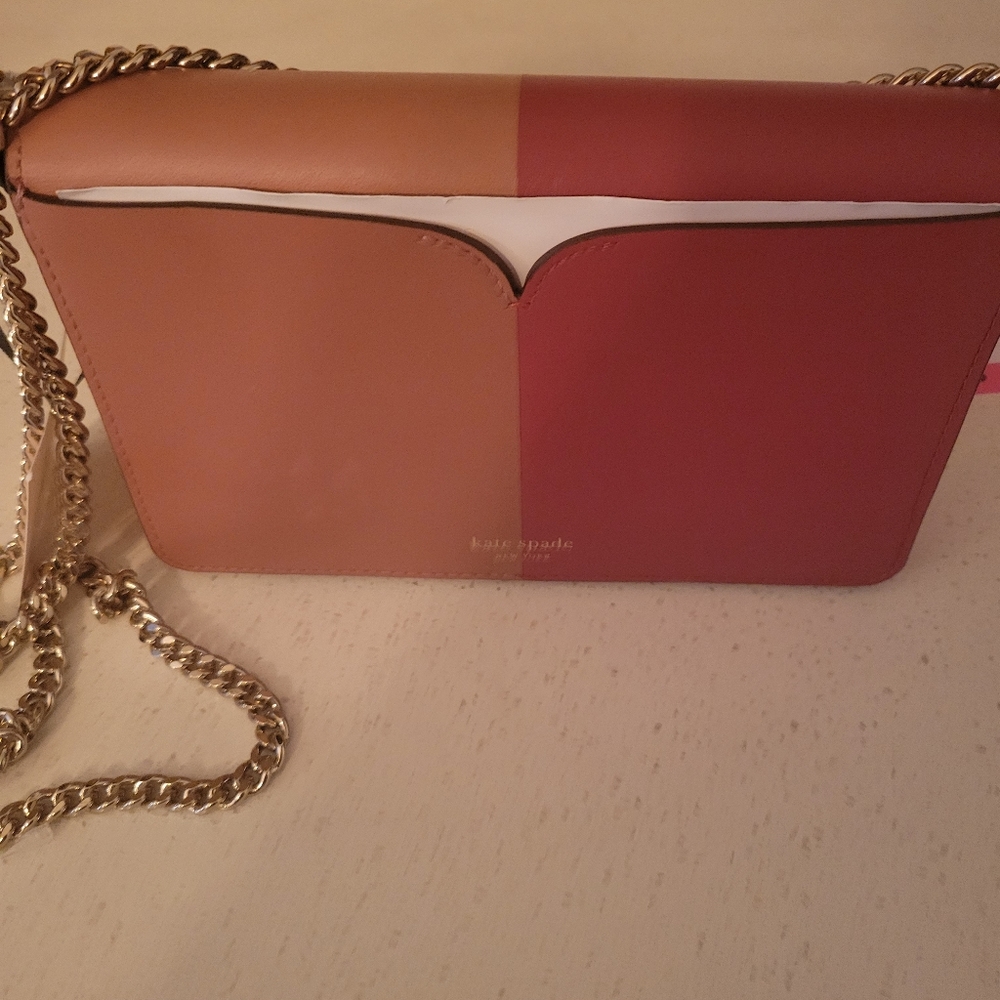 Kate Spade purse with tags.